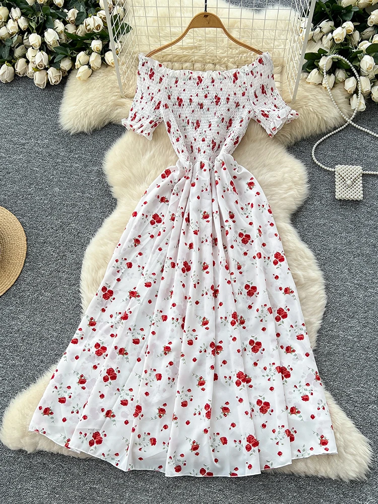 Vestidos de vacaciones en la playa para mujer, novedad de verano, estampado Floral, cuello barco, Sexy, fino, nicho, vestido con volantes irregulares, Famela A515