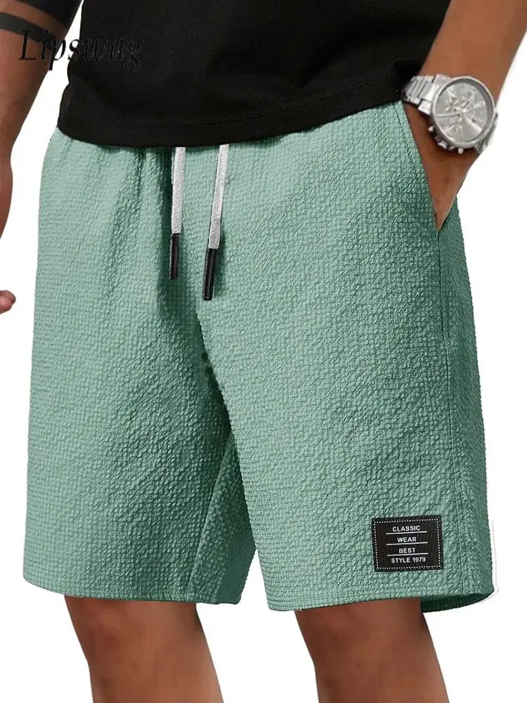 

Vintage Mens Solid Color Waffle Texture Shorts 2026 Summer Stylish Drawstring Loose Straight Shorts For Men Daily Leisure Shorts