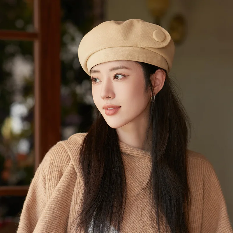 New autumn and winter hat for women, featuring a sophisticated button design, a beret that makes the face appear smaller, and a