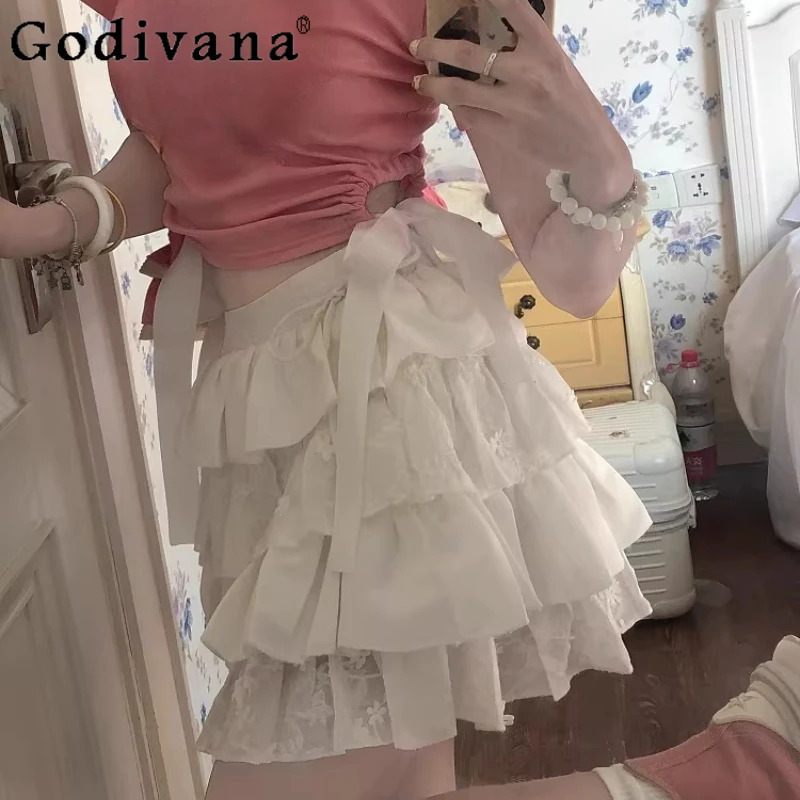 

Новая весенне-летняя юбка-кейк с бантом и кружевом, милая женская юбка А-силуэта с завышенной талией, универсальная, омолаживающая, белая, в стиле принцессы