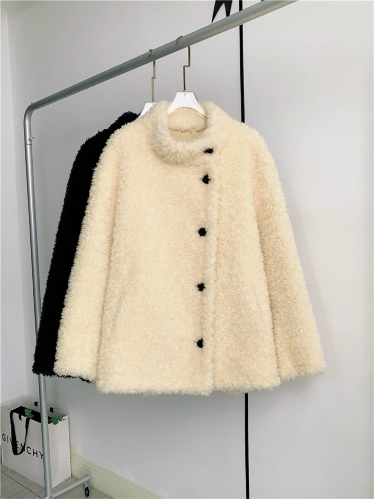 Cappotto riccio di pecora medio lungo spesso autunno e inverno giallo d'oca chiaro Pelliccia Haining pelliccia composita di pura lana femminile