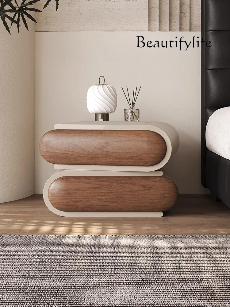 

Modern simple rotating bedside cabinet bedroom light luxury high-end walnut grain storage cabinet