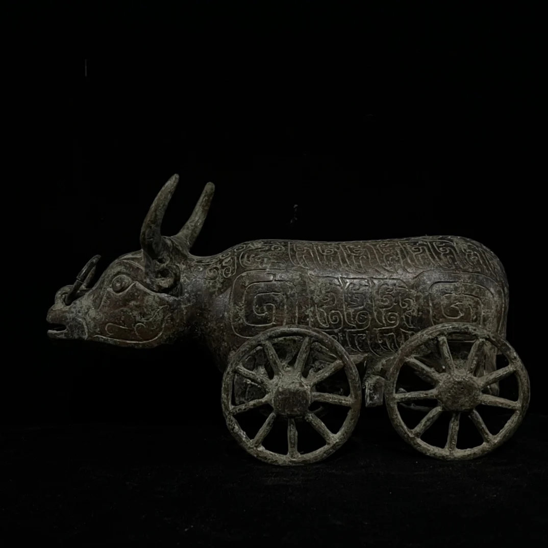Old bronze red rust green ox cart