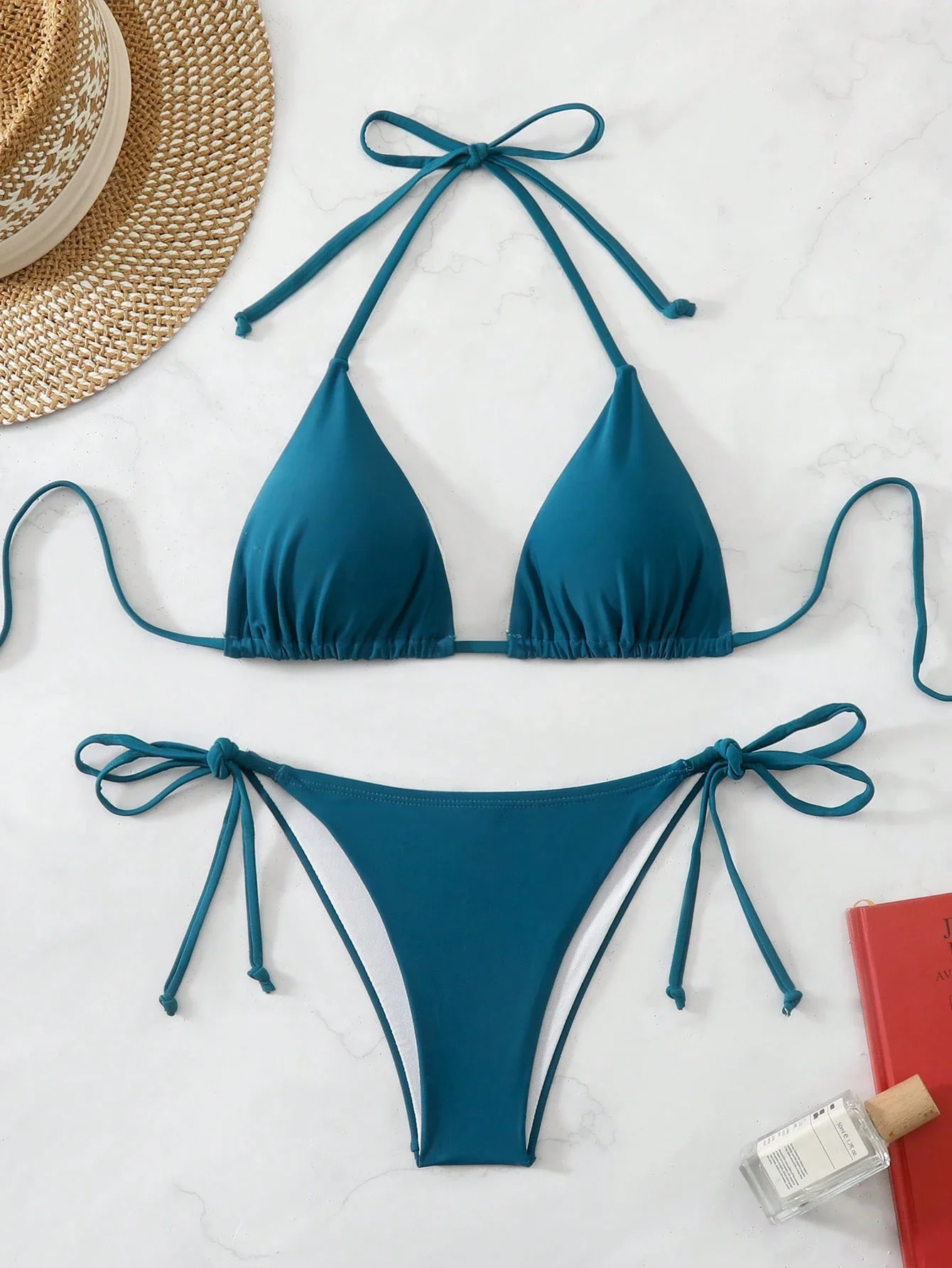 

Женский комплект бикини с треугольными чашечками и завязками по бокам, сине-бирюзовый