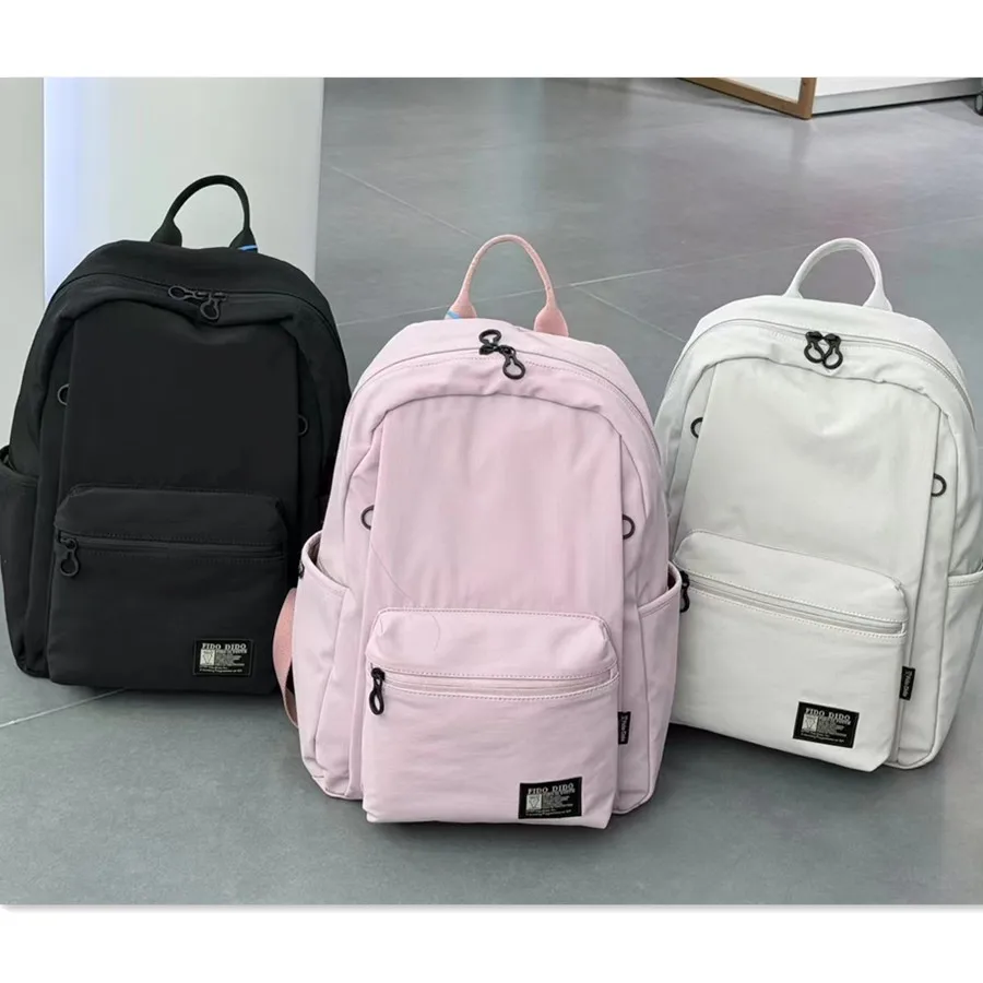 FIDO DIDO nueva mochila para estudiantes bolsa de viaje Simple de moda Oxford impermeable resistente al desgaste antirrobo auténtico 2530-1