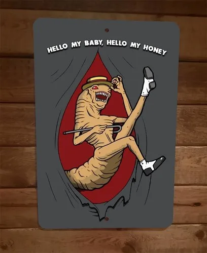 Metall-Wandschild „Hello My Baby Honey Alien Dancing“.