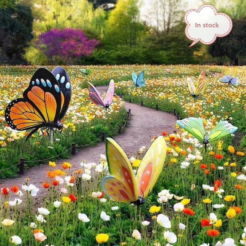 Butterfly lanterns are lit and decorated with landscape lights