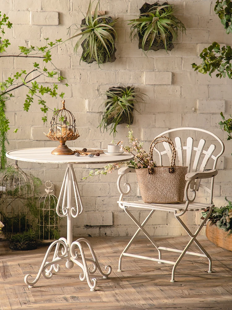 

French afternoon tea table and chair combination retro old garden outdoor courtyard wrought iron balcony small round table chair