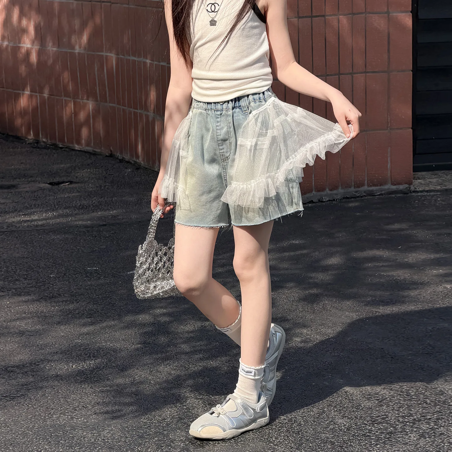 Girls' summer denim shorts 2026 new popular thin style fashionable and versatile children's loose lace fringed shorts for 4-14Y