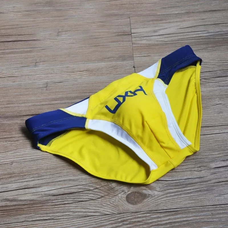 Classic 2025 men's fashion stitching briefs Japanese show beach swimming trunks close-fitting briefs UXH026