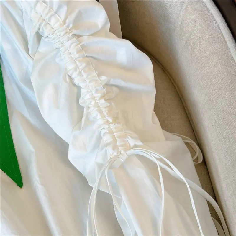 2025 outono novo grande pescoço apontado chique nicho solto casual branco emenda camisa feminina de manga comprida peter pan colarinho topo