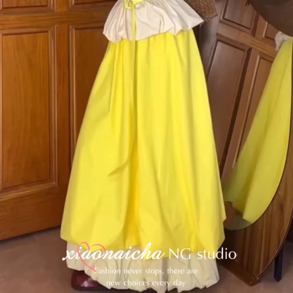 French sweet wind bud tube top women's 2026 spring and summer design sense yellow fluffy bud skirt