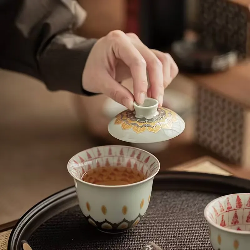 

Ceramic cultural and creative tea set with cover, featuring Dunhuang Ten Thousand Buddhas design, suitable for Gongfu tea ceremo