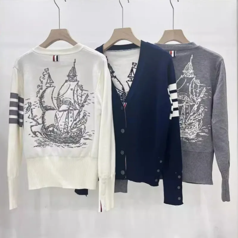 Autumn and winter new college style V-neck back full of sailboat pattern long sleeved striped knitted women's cardigan jacket