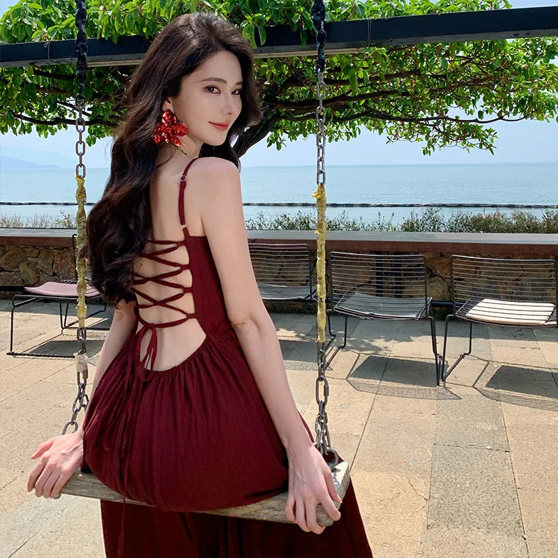 Nueva moda Sexy Spaghetti Strap espalda descubierta vestido sólido de las mujeres una línea de cintura delgada exquisitos vestidos de fiesta de vacaciones de verano