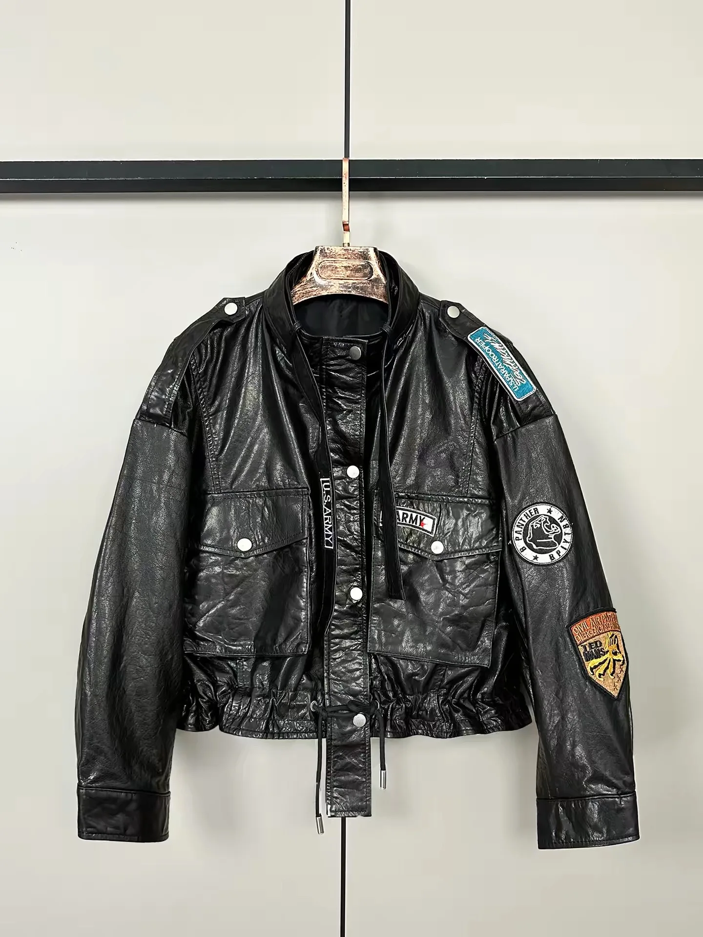 European and American short loose women's heavy-duty embroidered stand up collar leather jacket locomotive price