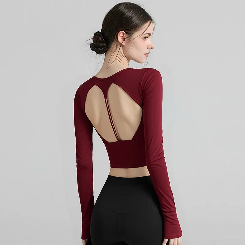 Femmes Sexy évider bretelles haut de sport coussinets manches longues Yoga Fitness Pilates haut d'en
