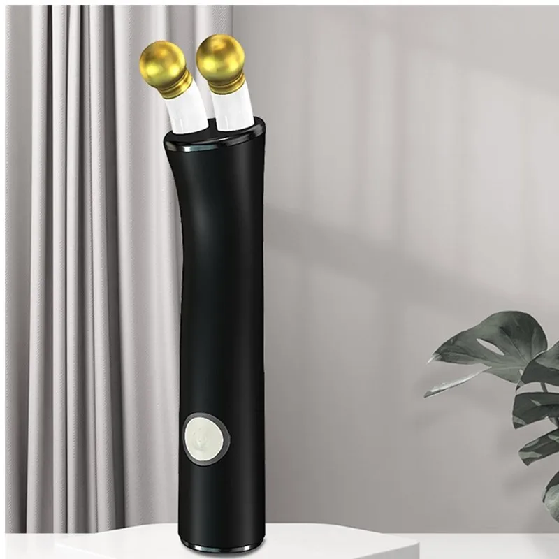 Nowy ręczny masażer do oczu z funkcją grzania i wibracji, urządzenie do pielęgnacji skóry i upiększania.