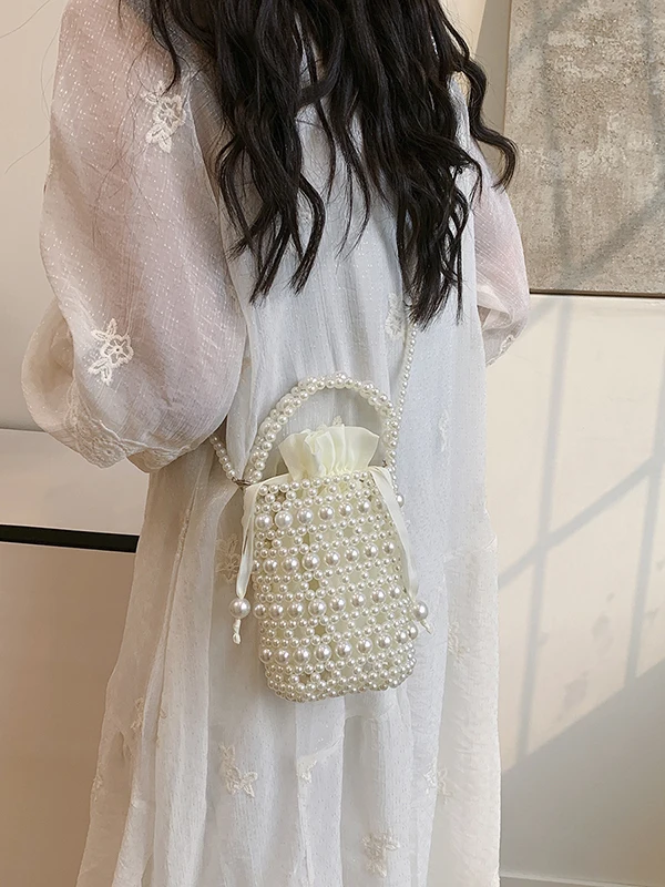 

Pearl Woven Hollow out Crossbody Bag for Women Spring Summer 2025 New Sle Soft Wind Design Beaded Slung Bag Korean Sle