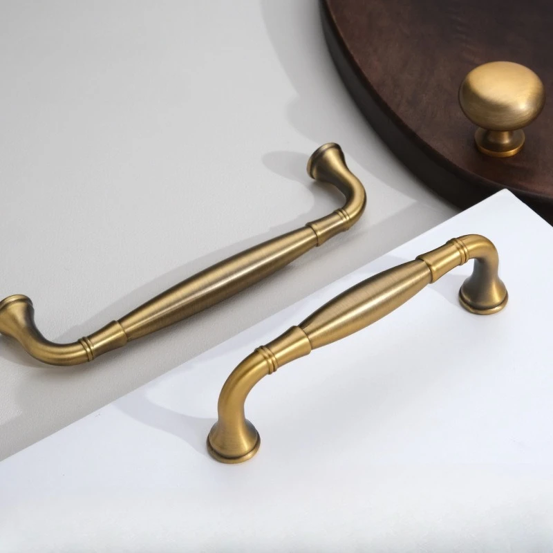 

Bronze-colored or copper-colored pull handle for vintage wardrobe cabinet drawer, French single-hole cabinet door handle