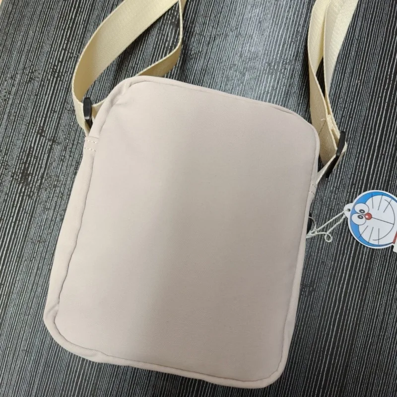 Anime Doraemon merchandise borsa di tela da donna di marca co, tracolla per studenti, borsa a tracolla di nicchia, borsa casual per cellulare, regalo