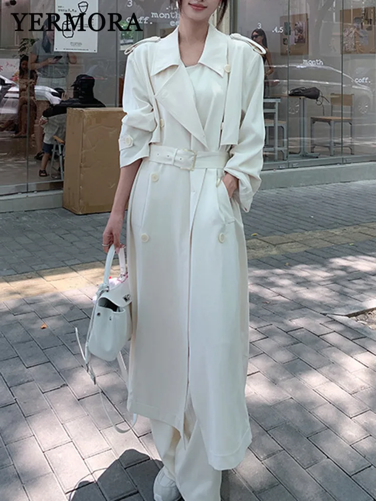 

YERMORA White Irregular Button Belted Trench For Women Lapel Long Sleeve Loose New Windbreaker Fashion Tide Spring Autumn 2025
