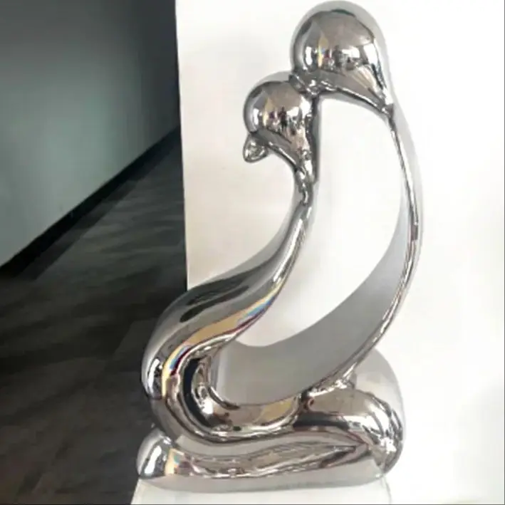 Zhaocai stainless steel couple decoration creative living room porch figure sculpture art model room