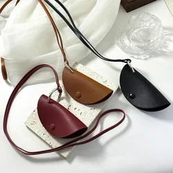 Trend minimalist hanging neck mini glasses bag, glasses storage bag, handmade leather semi-circular necklace bag