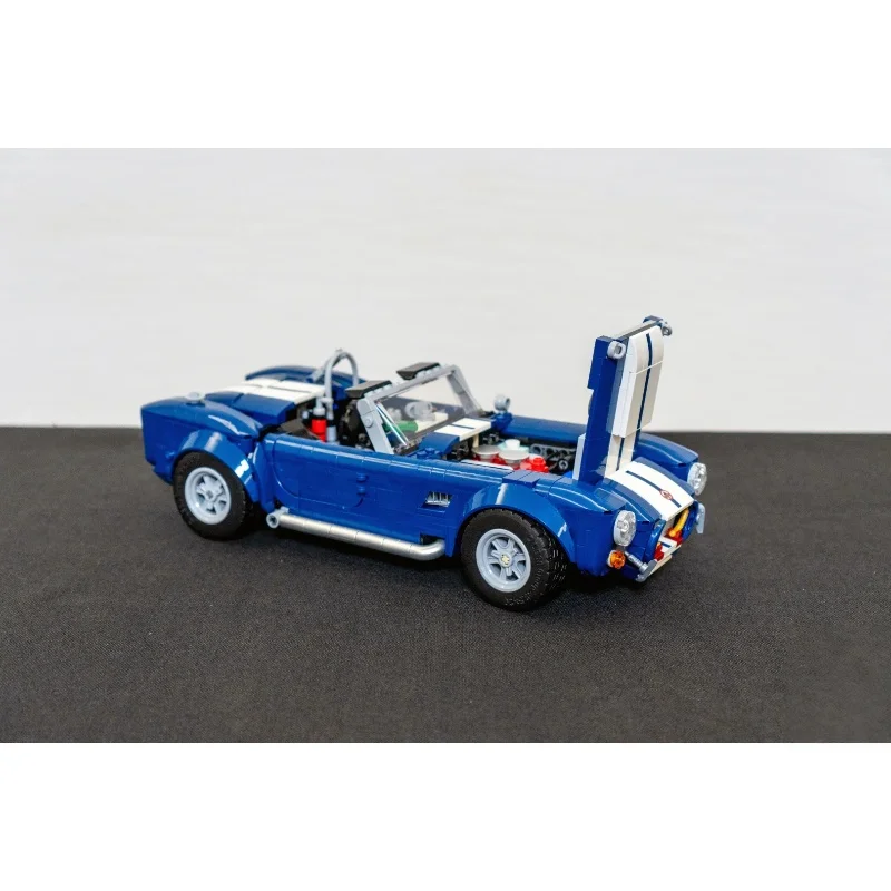 

Совместимый с MOC конструктор из 1241 детали: Модель автомобиля Shelby Roadster, механический набор для сборки, игрушка-подарок для взрослых