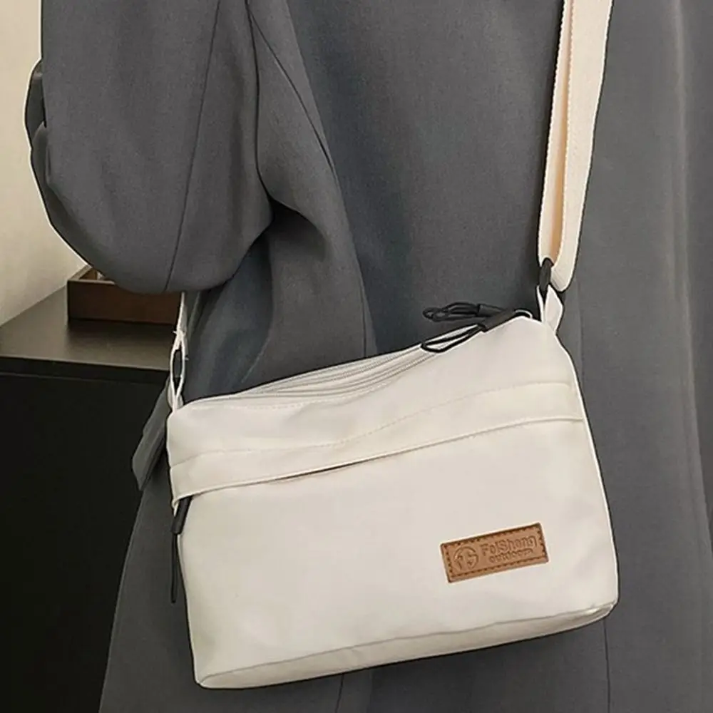 حقيبة كتف كاجوال عصرية عبر الجسم بسيطة ذات سعة كبيرة ومتعددة الجيوب حقيبة يد محمولة حقيبة ساعي البريد