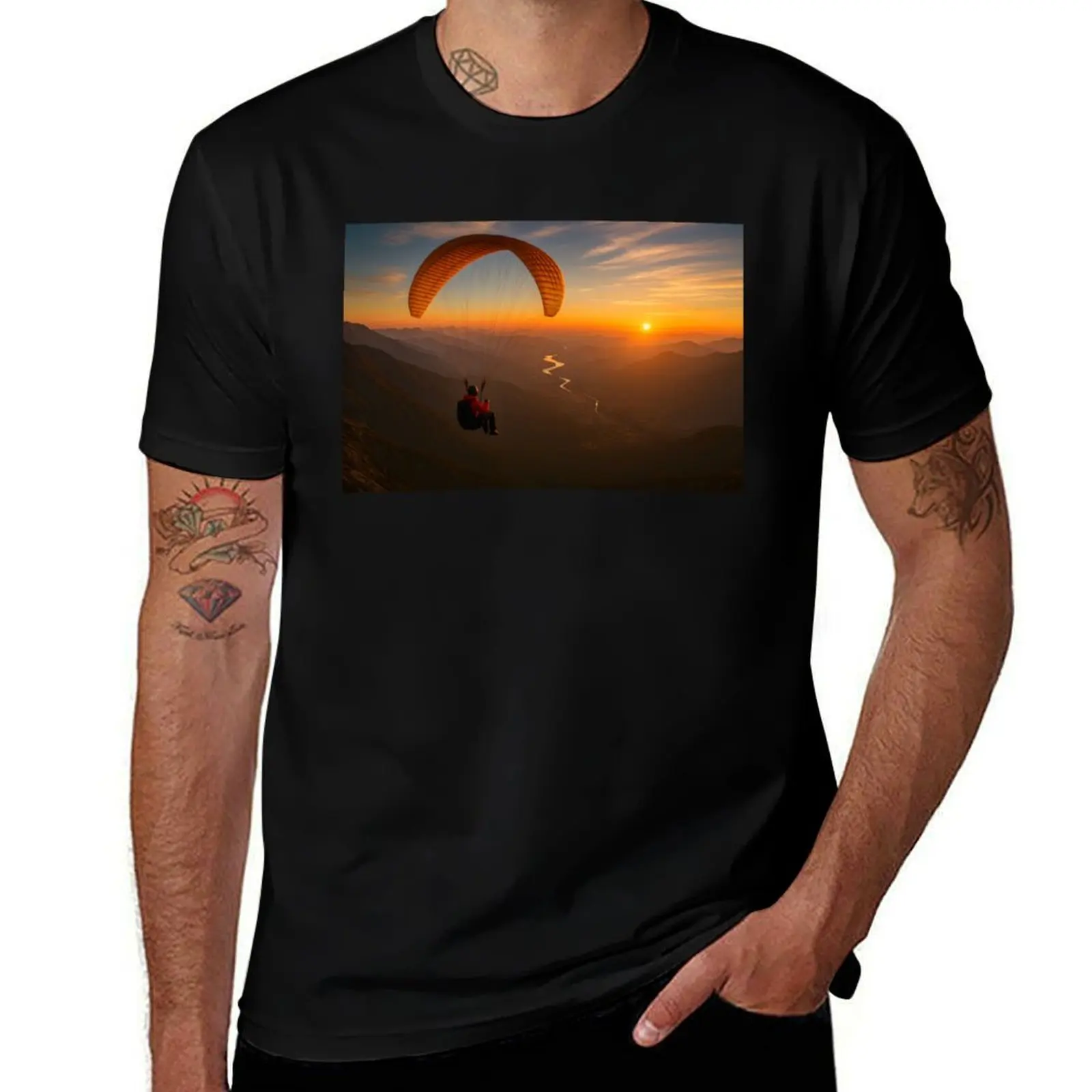 

Paraglider soaring over mountains at a vibrant sunset T-Shirt luxury t-shirt Aesthetic clothing summer shirt tshirts for men