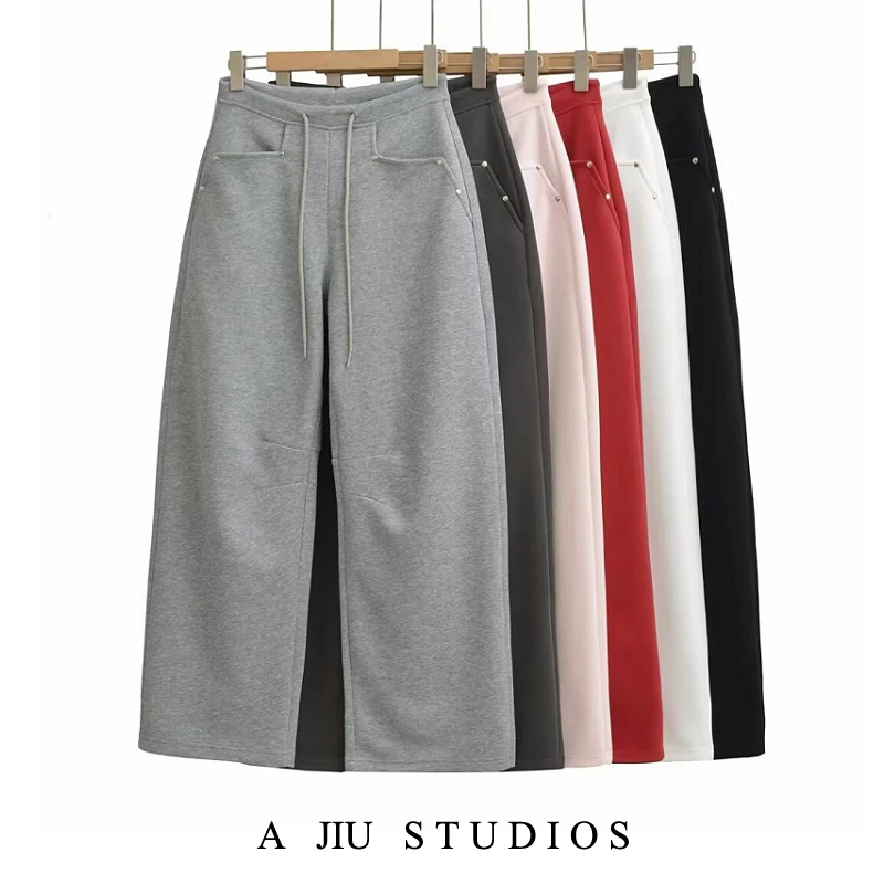 กางเกงวอร์มทรงหลวมเอวต่ำสไตล์อเมริกันย้อนยุคสำหรับผู้หญิง ใส่ได้หลายโอกาสในฤดูใบไม้ร่วง ทรงหลวมแบบกางเกงบานาน่า สไตล์ลำลอง