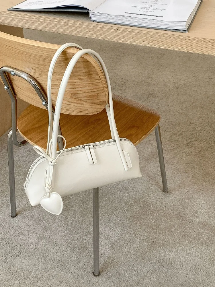 تنوعا الرجعية الكورية نمط القلب الرغيف الفرنسي حقائب اليد للنساء بلون بولي Leather حقائب جلدية تحت الإبط بسيطة التنقل عادية حمل