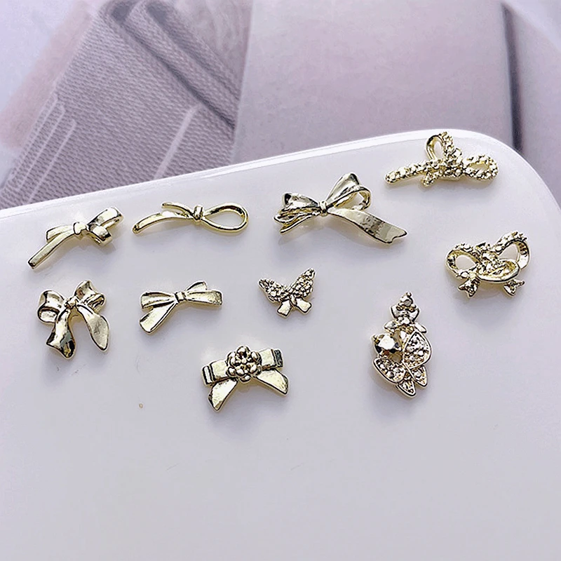 20PCS 3D 골드 금속 Bowknot 네일 아트 나비 매력 나비 넥타이 액세서리 매니큐어 장식 손톱 장식 용품 재료