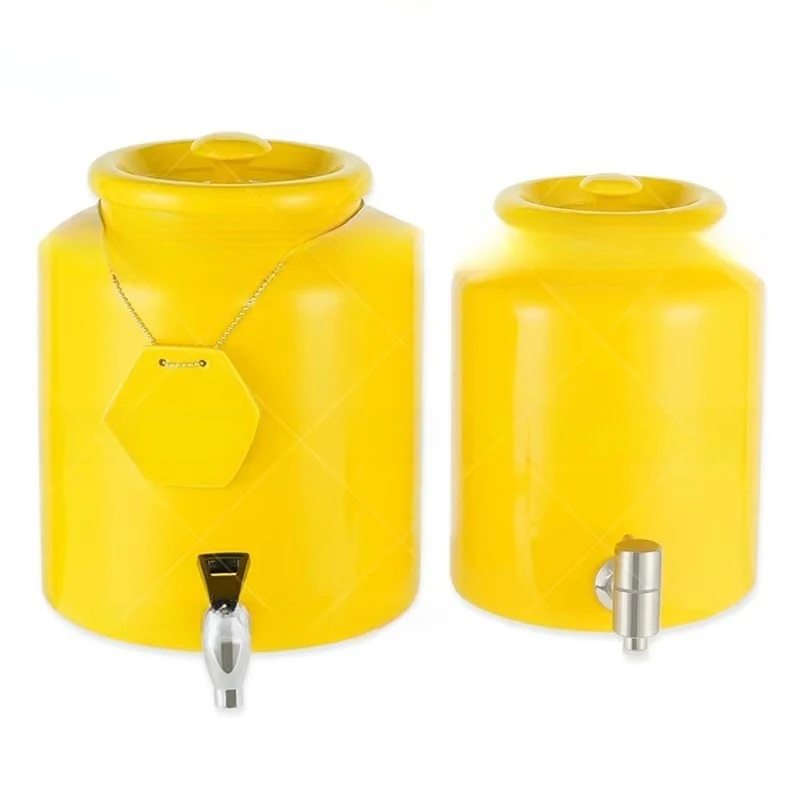 Factory produces yellow ceramic juice milk dispenser with rose gold electric heating base