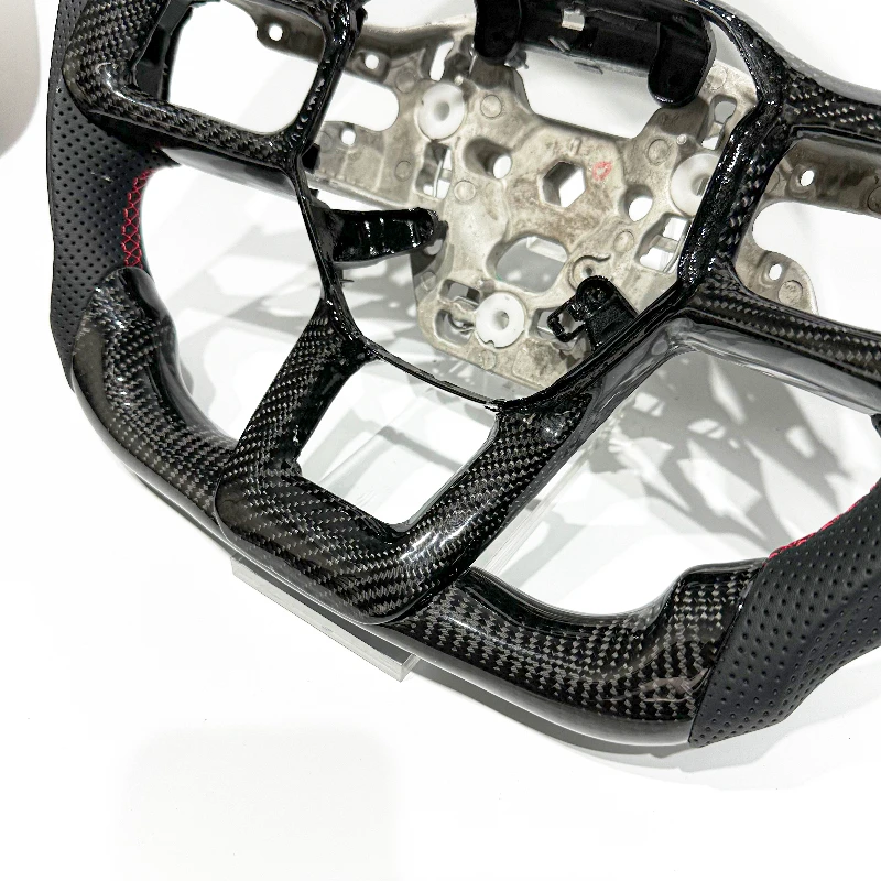 Sporty carbon fiber steering wheel for the new Ford Mustang view 3