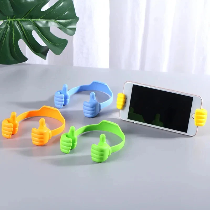 

1/2/4pcs Thumb Up Phone Stand Lazy Thumb Stand Portable Elastic Creative Universal Phone IPad Stand Phone Stand