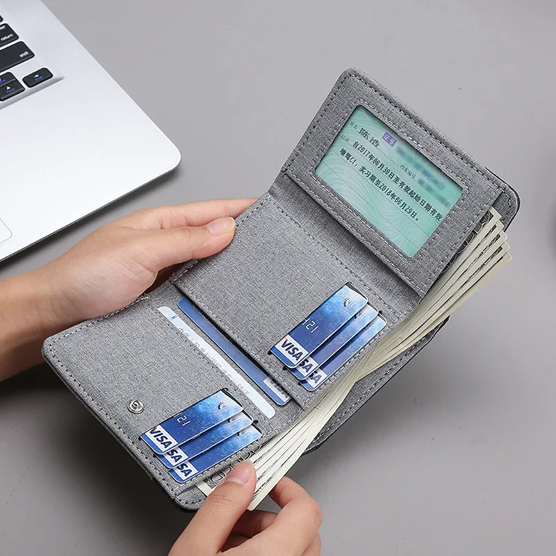 Hotel Transylvania Drácula Cartera de lona a la moda para hombre Personaje de anime Bolsa de tarjeta con clip para cambio de estudiante Bolsa de almacenamiento de cambio de mezclilla