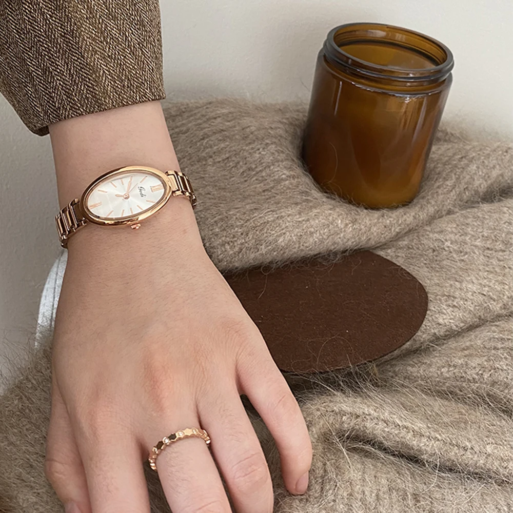 Simplicity Temperament Oval design with steel strip quartz Watch For women girl  watch  Women's accessories