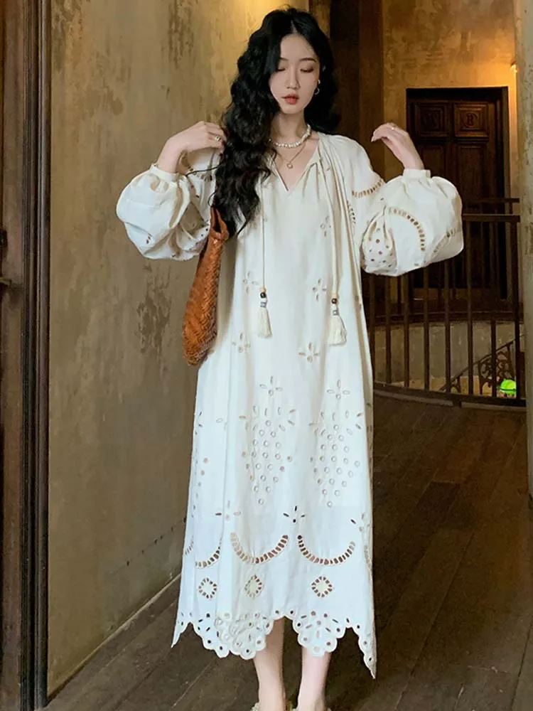 Abiti lunghi bohémien Vintage donna autunno manica lunga scava fuori il vestito femminile stile francese elegante vestito da festa con nappe di moda