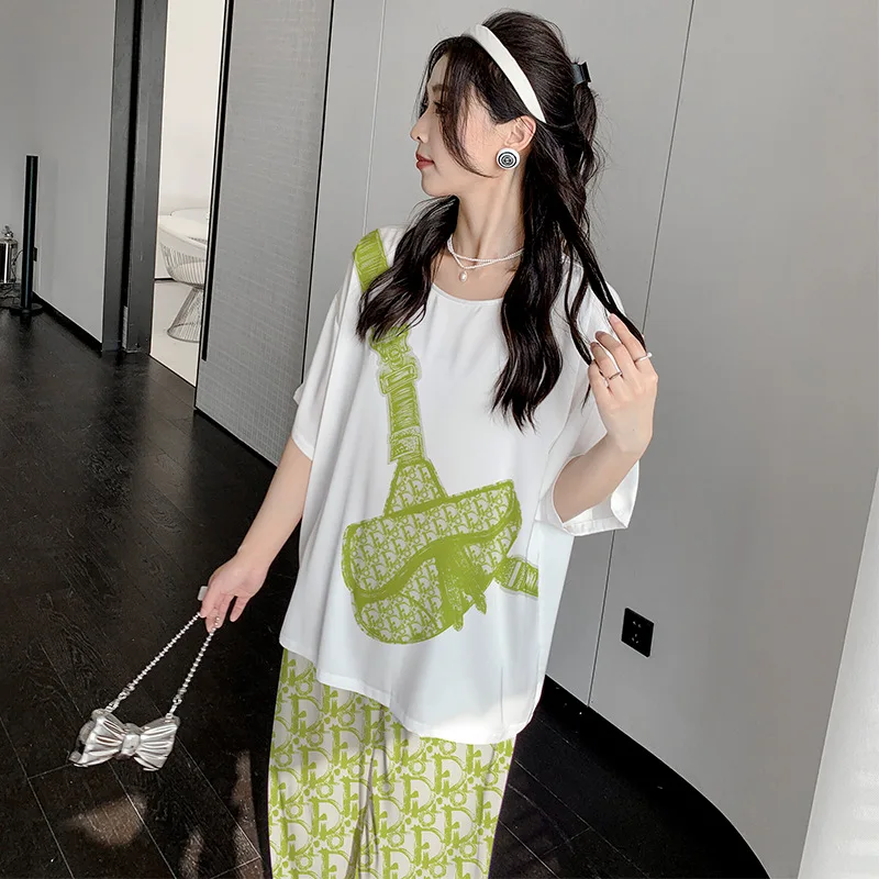 

Женский милый пижамный комплект из атласного ледяного шелка — летняя тонкая милая студенческая одежда с короткими рукавами и длинными брюками, одежда для дома 2579, легкая повседневная одежда