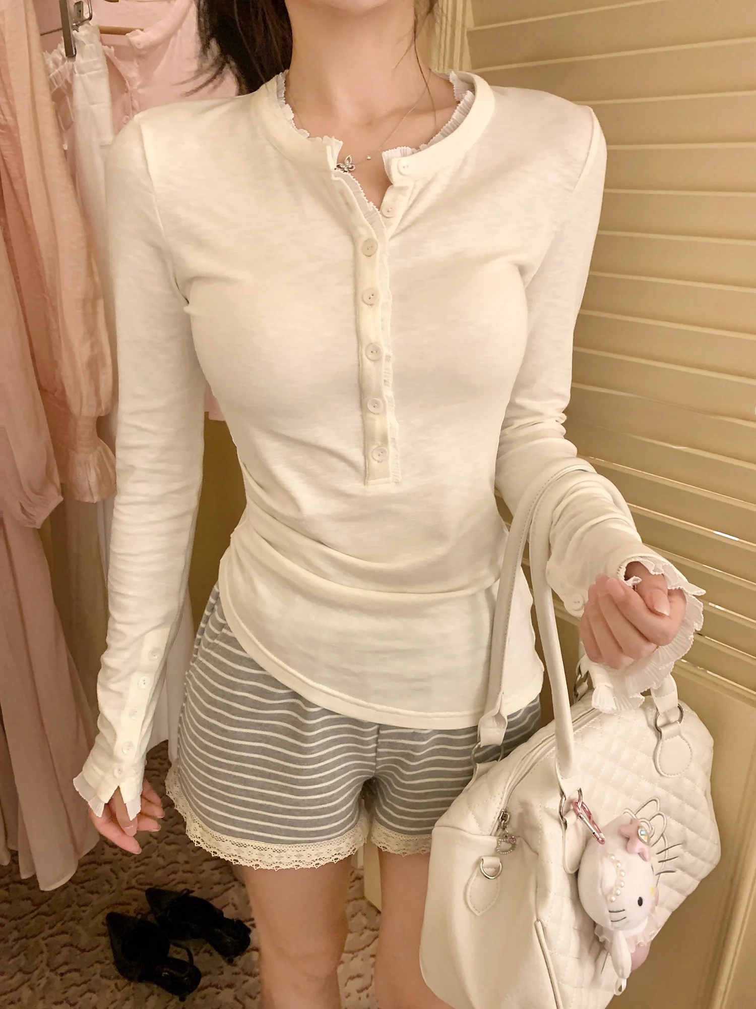 

Весенняя женская повседневная футболка с длинным рукавом POSEME NGMousse Cheese Henry, с завышенной талией, асимметричным подолом и облегающим кроем