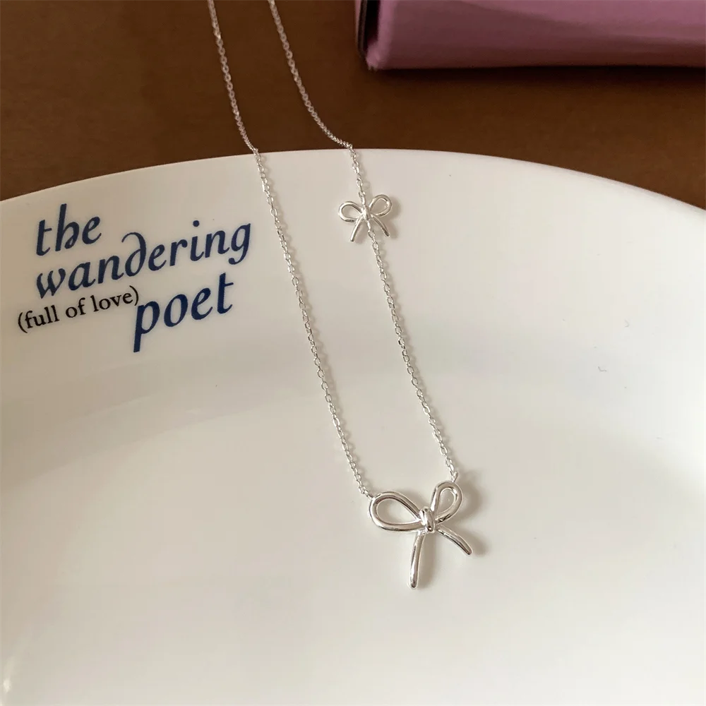 

S925 Sterling Silver Niche Premium Collarbone Chain, Korean Style, 18K Gold-plated Double Bowknot Sweet Jewelry