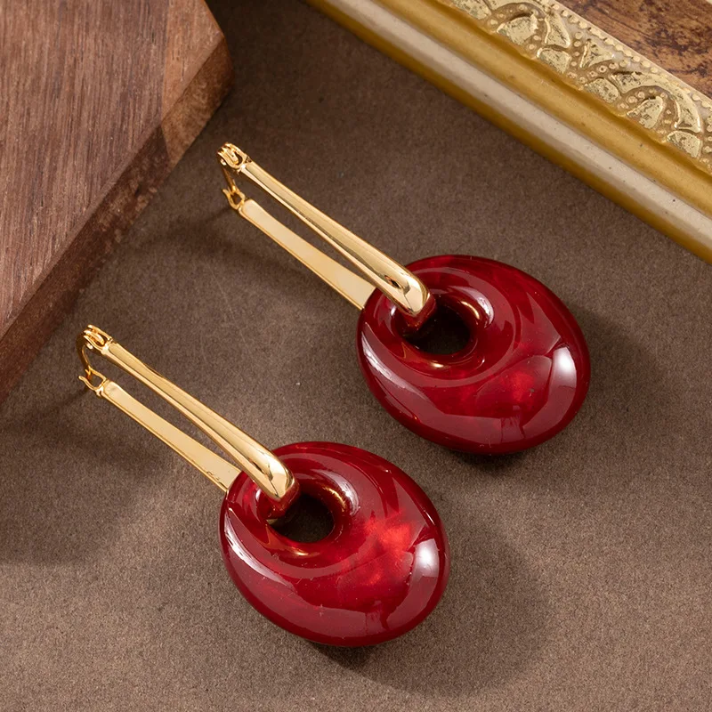 Fashionable, exquisite and personalized New Year's festive red resin earrings niche light luxury high-end temperament earrings