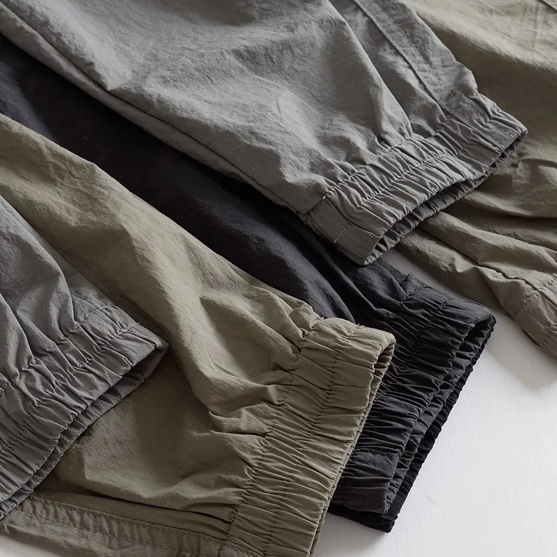 Nuovi pantaloni da lavoro in seta di ghiaccio da uomo 2024 larghi sottili Qui Dry pantaloni lunghi sportivi casual giapponese Sle elastico vestibilità ampia giovanile