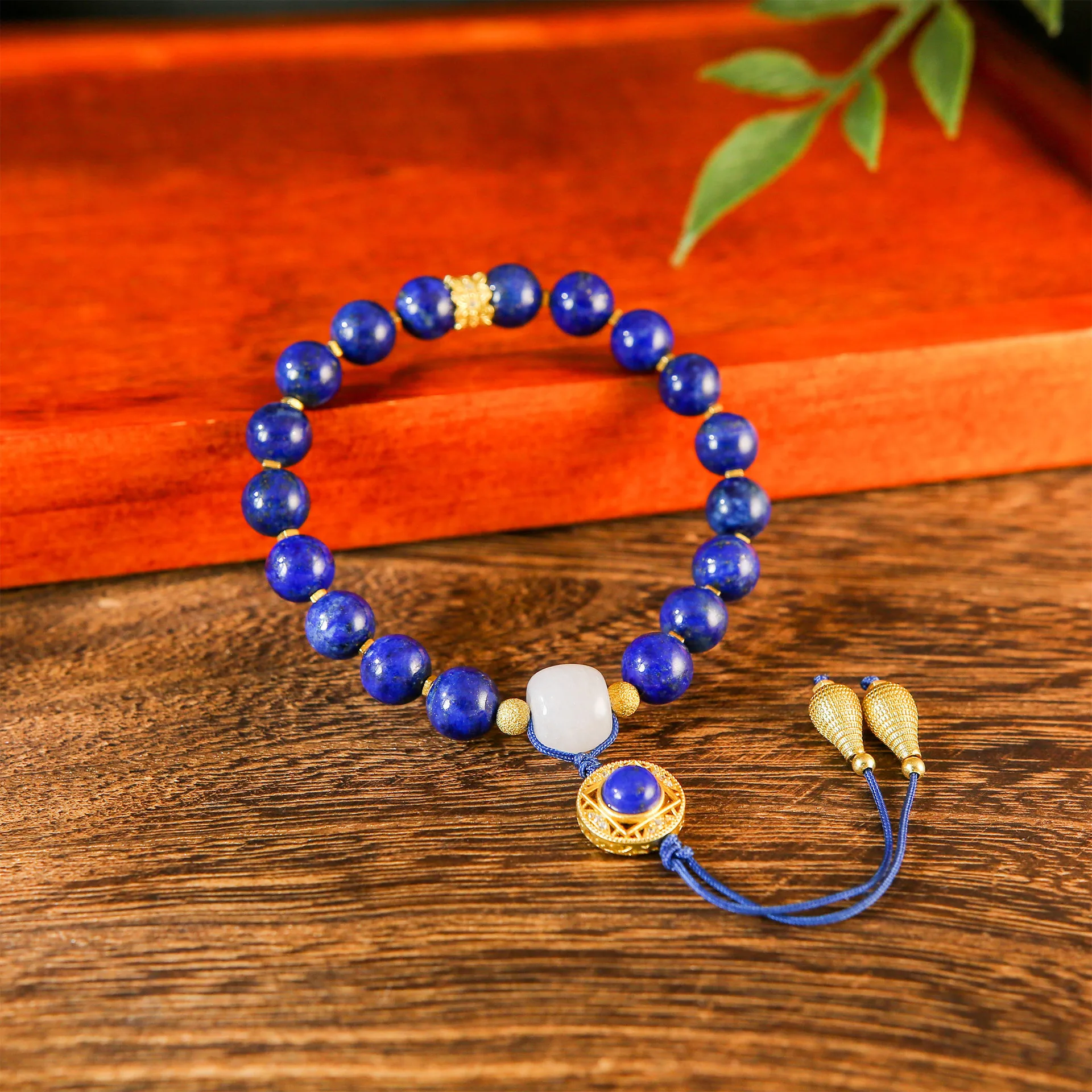 

Lapis Lazuli Beaded Bracelet with White Jade & Gold Filigree Pendant – Elegant Oriental Style Prayer Beads