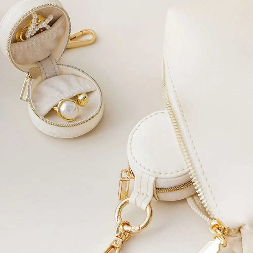 

Creative Solid Colored PU Jewelry Case Round With keyring Jewelry Storage Box PU Leather Luxury Necklace Ring Case Travel