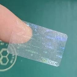 100 peças 25x15mm holograma transparente selo de segurança semi-oculto sutil adesivo holográfico universal etiqueta genuína original