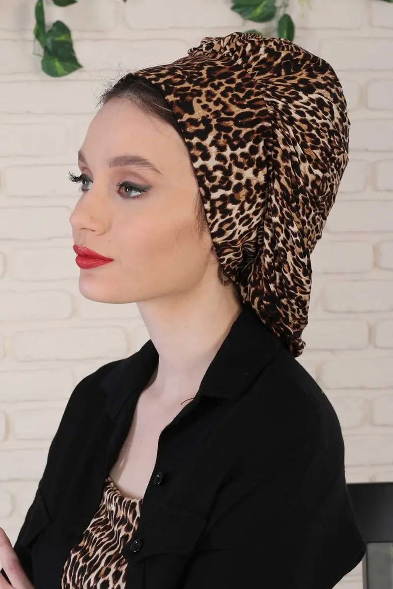 Motif léopard drapé, os peigné