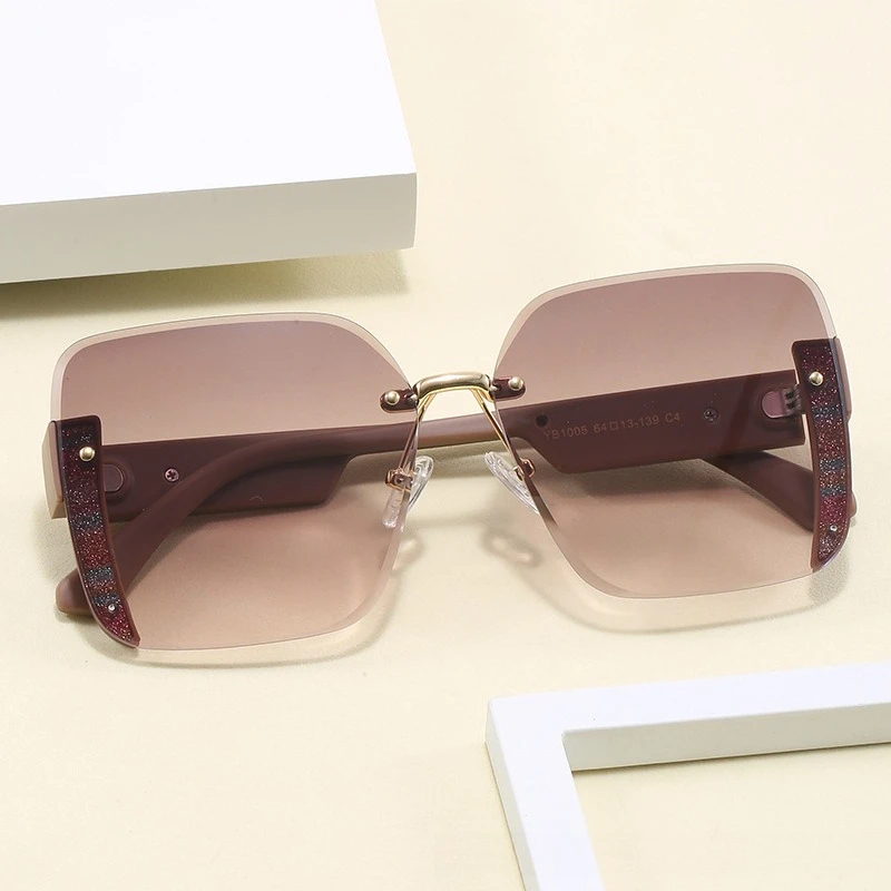 

​​2025 New Rimless Oversized Sunglasses Women, Square Cut Edge Retro Street Style Slimming for Round Face​​